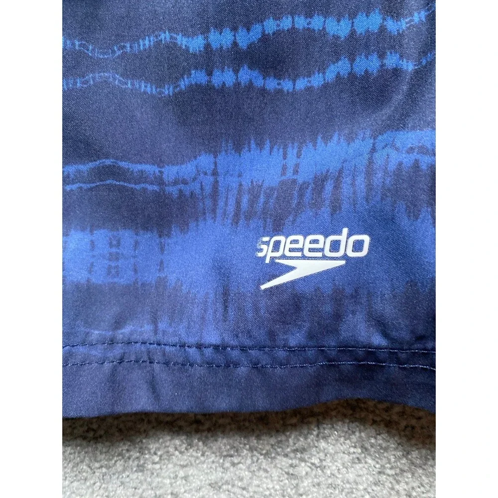 Speedo Two Men’s blue stripped bathing suit.